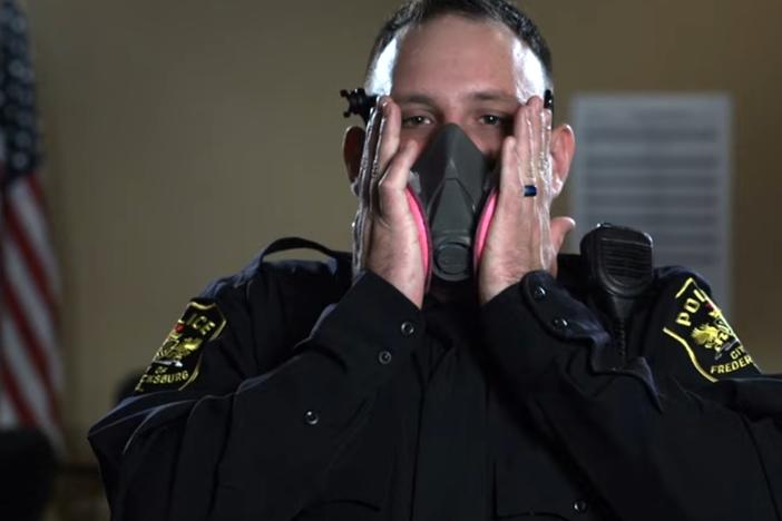 Critics say U.S. government training videos like this one from the Centers for Disease Control and Prevention exaggerate fears of fentanyl exposure among police.