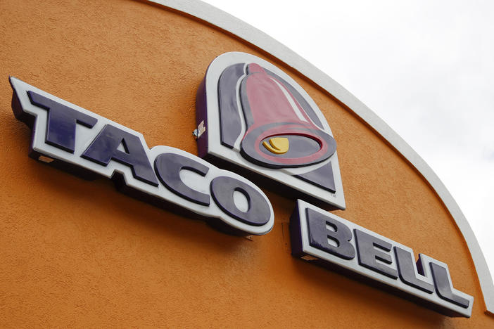 A sign hangs at a Taco Bell on May 23, 2014, in Mount Lebanon, Pa. Declaring a mission to liberate "Taco Tuesday" for all, Taco Bell asked U.S. regulators Tuesday, May 16, 2023, to force Wyoming-based Taco John's to abandon its longstanding claim to the trademark.
