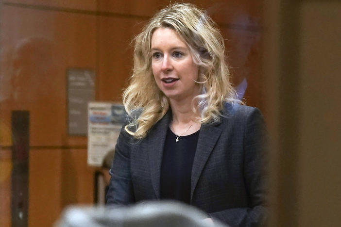Former Theranos CEO Elizabeth Holmes arrives at federal court in San Jose, Calif., Oct. 17, 2022.