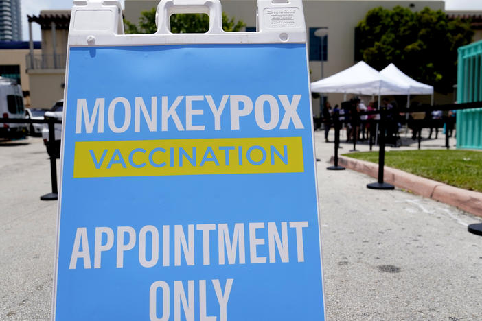 A sign for monkeypox vaccinations is shown at a vaccination site in Miami Beach, Fla.