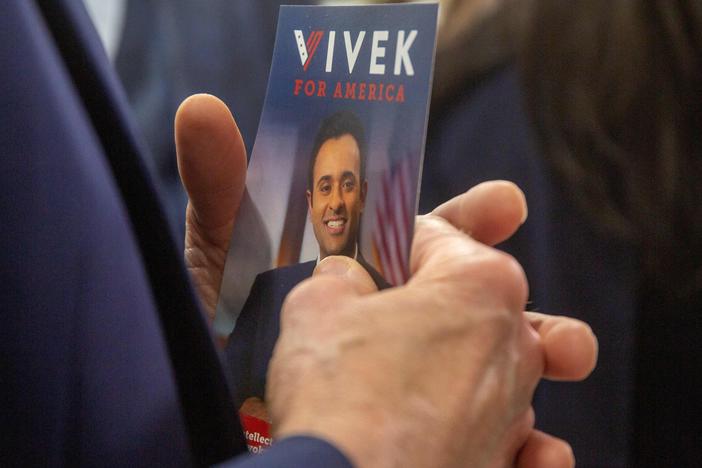 An event goer holds a pamphlet for U.S. entrepreneur and 2024 presidential hopeful Vivek Ramaswamy during the Iowa Faith and Freedom Coalition's Road to Victory Conference at the Horizon Events Center in Clive, Iowa, on April 22, 2023.