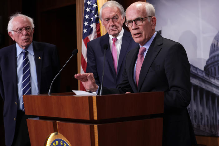 Democratic Sen. Peter Welch of Vermont, flanked by Sens. Bernie Sanders of Vermont and Ed Markey of Massachusetts, addressed concerns about debt limit negotiations during a press conference on Thursday. A group of Senate Democrats sent a letter to President Biden urging him to invoke the 14th Amendment to avoid a debt default if he can't reach a deal with Republicans.
