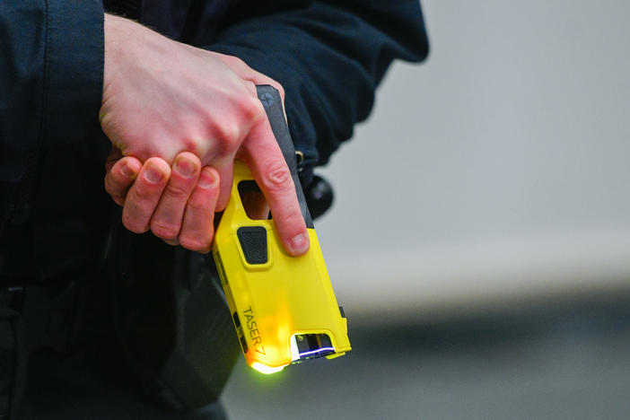 An Australian nursing home resident is in critical condition after being stunned by a Taser and collapsing to the floor.