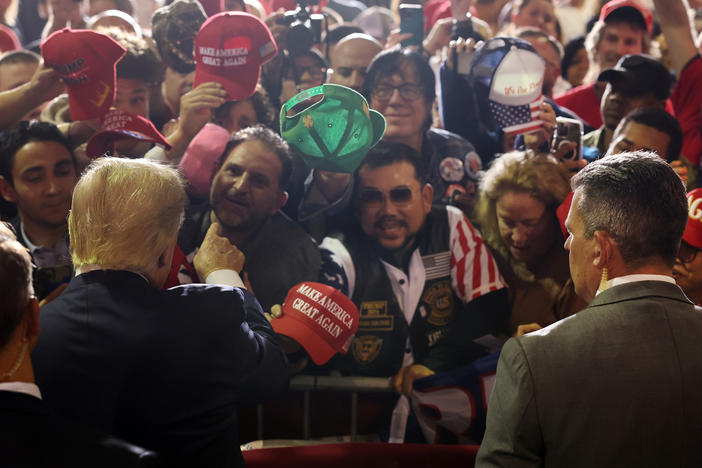 Former President Donald Trump greets supporters at a campaign rally on April 27, 2023 in Manchester, N.H.