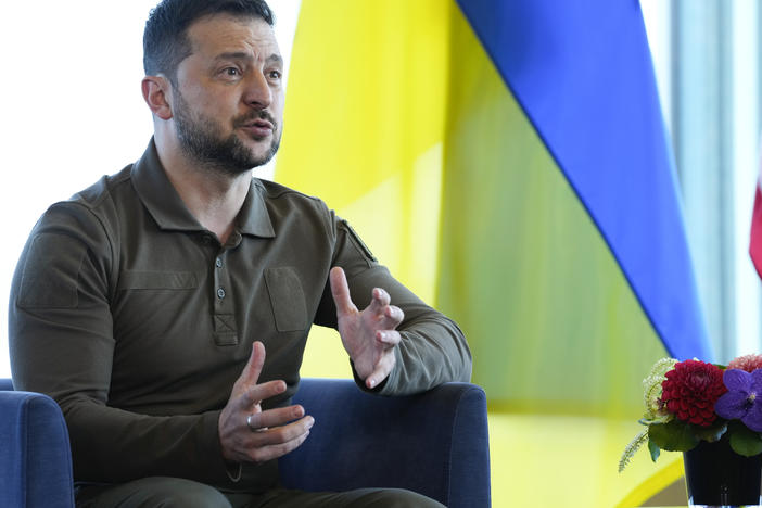 Ukrainian President Volodymyr Zelenskyy gestures during a meeting with President Joe Biden on the sidelines of the G7 Summit in Hiroshima, Japan, Sunday, May 21, 2023.