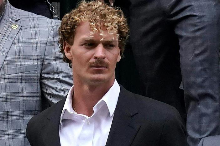 Daniel Penny is walked out of the New York Police Department 5th Precinct on May 12 after he surrendered to authorities after being charged with second degree manslaughter in the chokehold death of Jordan Neely.