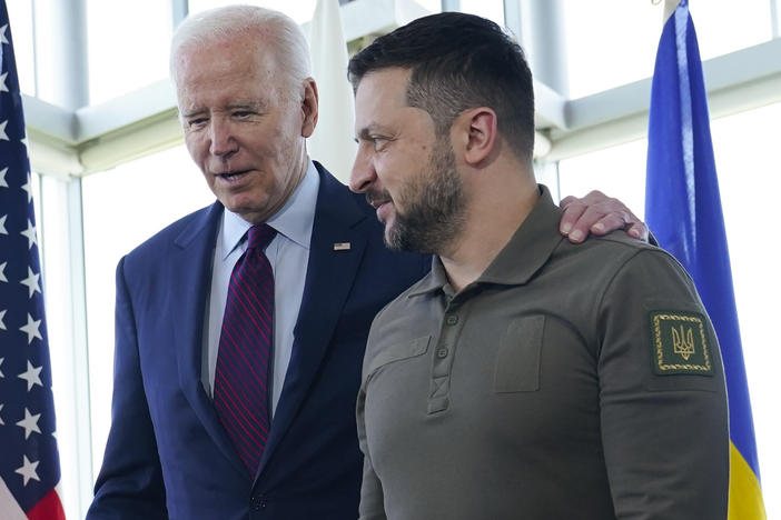 President Biden walks with Ukrainian President Volodymyr Zelenskyy ahead of a working session on Ukraine during the Group of Seven summit in Hiroshima, Japan, Sunday. In a win for the Ukrainian leader, Biden supported training Ukraine's pilots to fly F-16s.