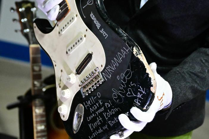 Kurt Cobain's smashed Fender Stratocaster is displayed at Julien's Auctions in Gardena, Calif., on May 2 ahead of Julien's "Music Icons" auction of over 1,200 items from rockhistory and exclusive artist collections.