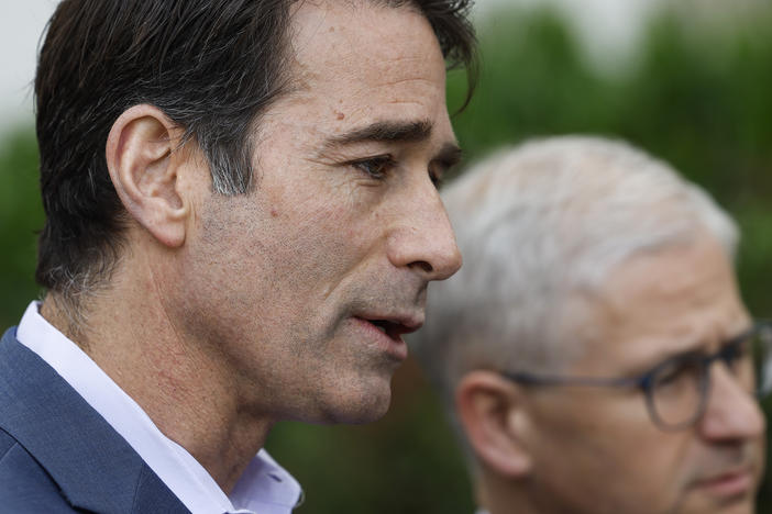 Rep. Garret Graves, R-La., and Rep. Patrick McHenry, R-N.C., speak to reporters about negotiations on the debt limit outside of the House Republican conference meeting on Capitol Hill.
