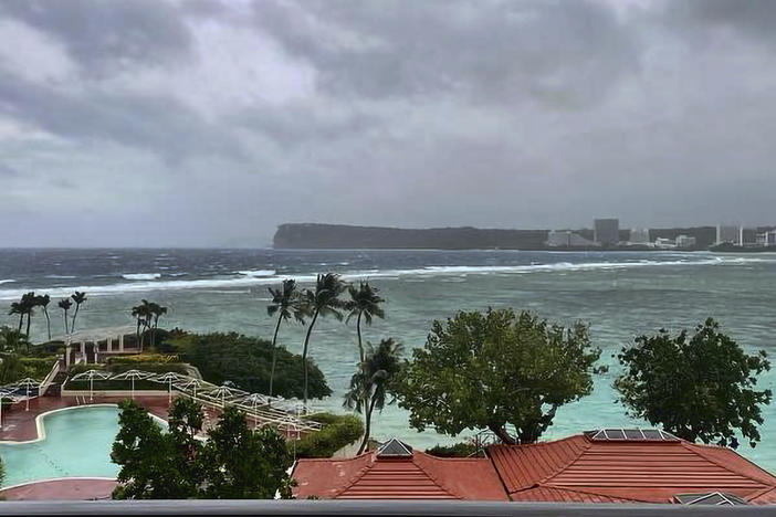 This photo provided by the U.S. Coast Guard shows the typhoon closing in on Tumon Bay, Guam on Tuesday.