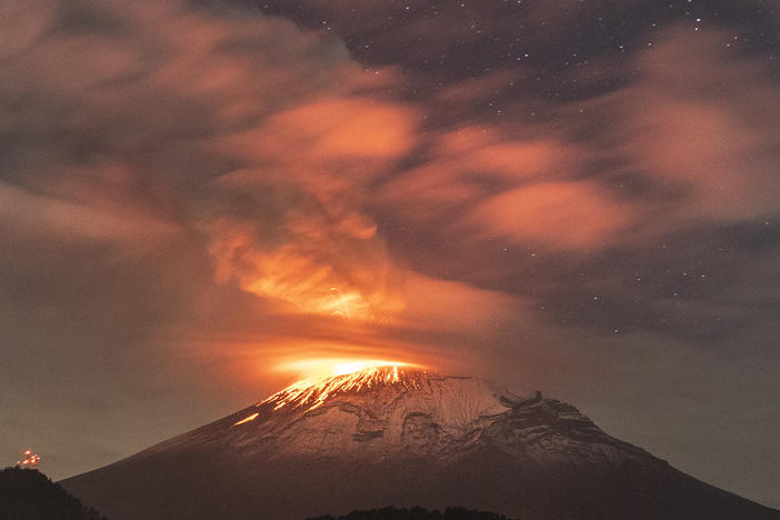 Popocatépetl volcano spews incandescent material on Tuesday. The second highest volcano in the Mexico increased its activity, and authorities raised the alert to the second-highest level.