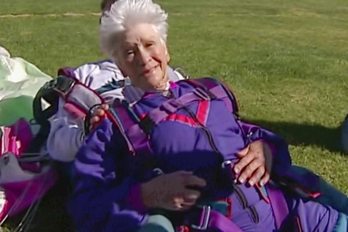 In this image made from video, Clare Nowland reacts following her skydive in Canberra, Australia April 6, 2008.