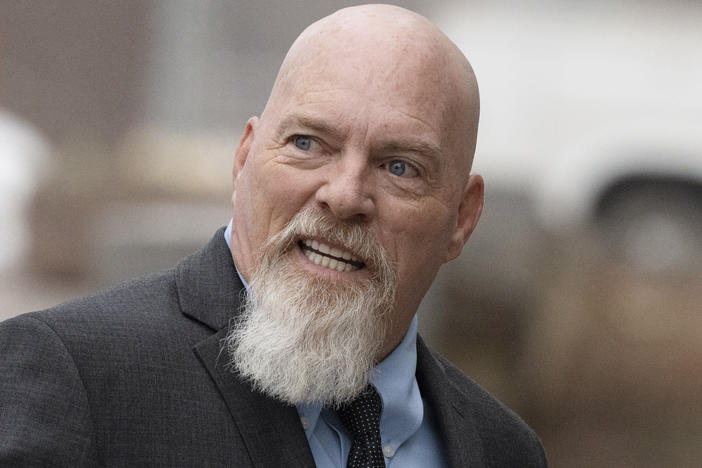 Richard Barnett, an Arkansas man who was photographed with his feet on a desk in former House Speaker Nancy Pelosi's office during the Jan. 6 U.S. Capitol riot, arrives at federal court in Washington, Jan. 10, 2023.