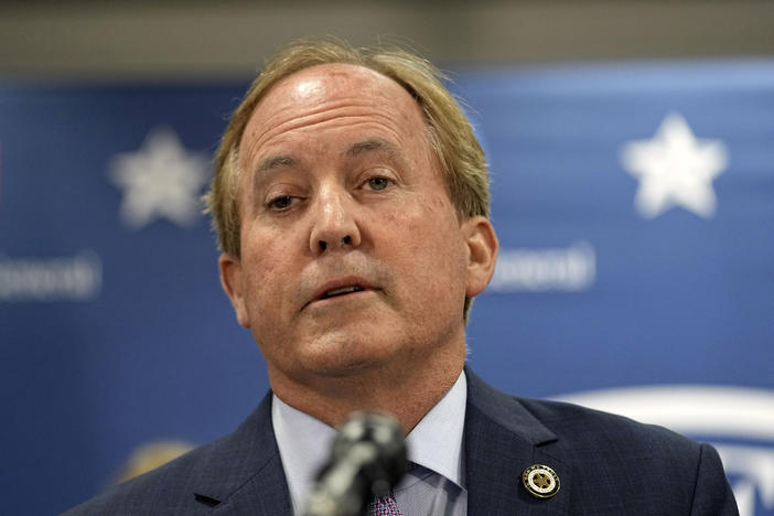 Texas state Attorney General Ken Paxton reads a statement at his office in Austin, Texas, Friday, May 26, 2023. An investigating committee says the Texas House of Representatives will vote Saturday on whether to impeach.