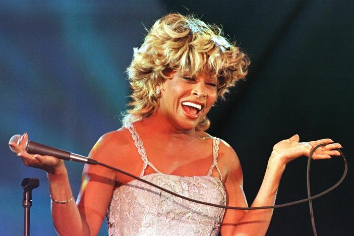 Tina Turner sings during her performance at the Macy's Passport '97 fundraiser and fashion show in San Francisco.