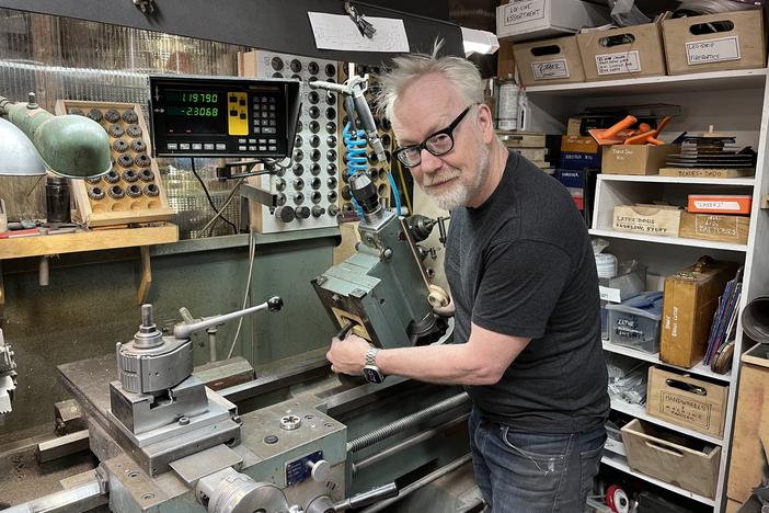 Adam Savage, host of <em>Tested, </em>and right to repair advocate, shows off the lathe he's fixing at his San Francisco workshop.