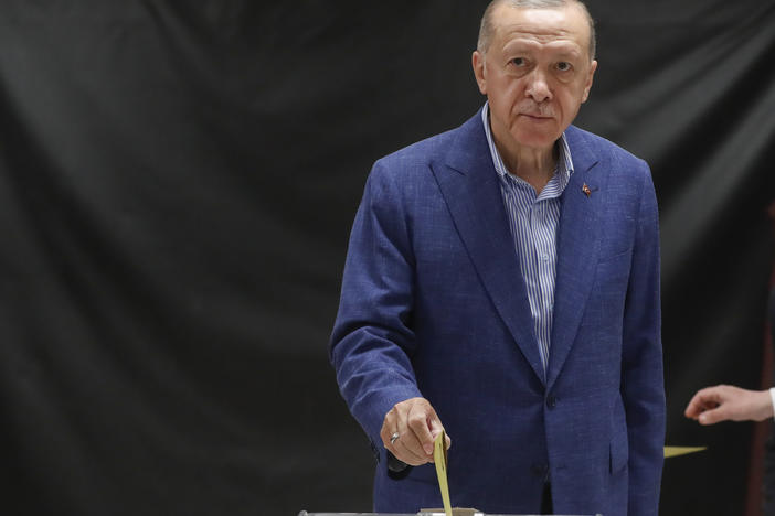 Turkish President Recep Tayyip Erdogan casts his ballot at a polling station during the second round of the presidential election in Istanbul, on Sunday.