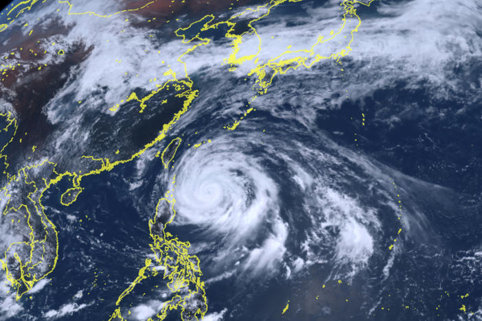 This satellite image released by National Institute of Information and Communications Technology shows Typhoon Mawar approaching Philippine northern provinces on Monday.