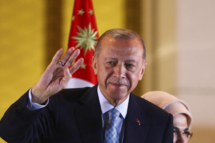 Recep Tayyip Erdogan makes a speech at the presidential palace, in Ankara, Turkey, on Sunday after securing five more years in office.