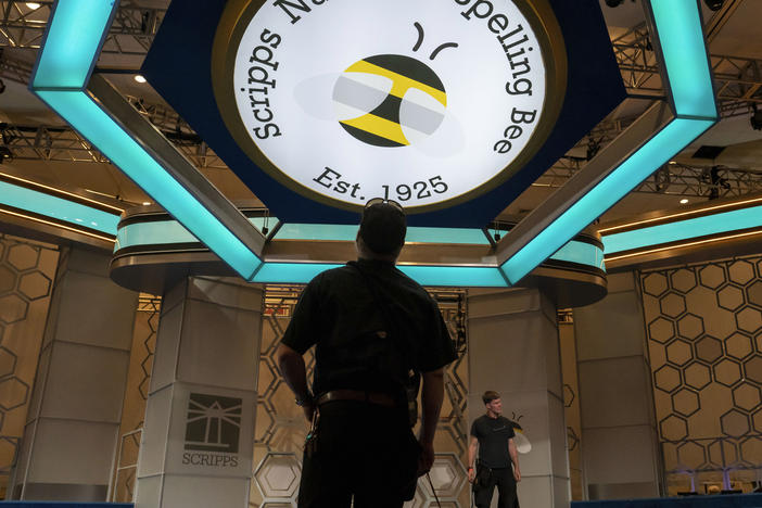 Crew members assemble the main stage ahead of the 2023 Scripps Nations Spelling Bee on Sunday, May 28, 2023, at National Harbor in Oxon Hill, Md.