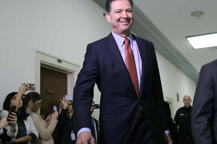 Former FBI director James Comey before testifying on Capitol Hill in 2018.