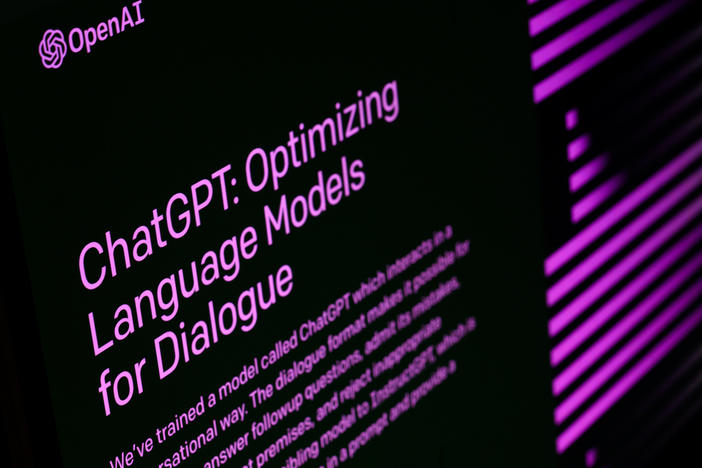 The welcome screen for the OpenAI ChatGPT app is displayed on a laptop screen in February in London.