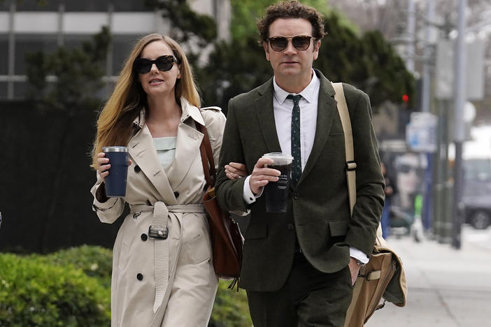 Danny Masterson and his wife Bijou Phillips arrive for closing arguments in his second rape trial on May 16, 2023, in Los Angeles.