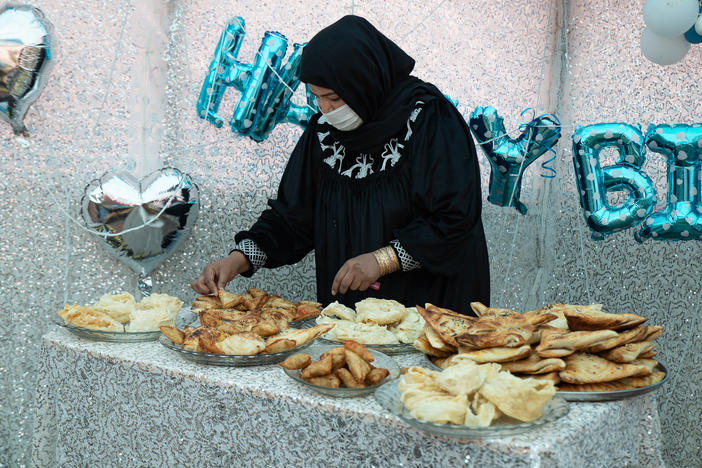 Samira Muhammadi, the owner of Banowan-e-Afghan restaurant, prepares food for a birthday party.