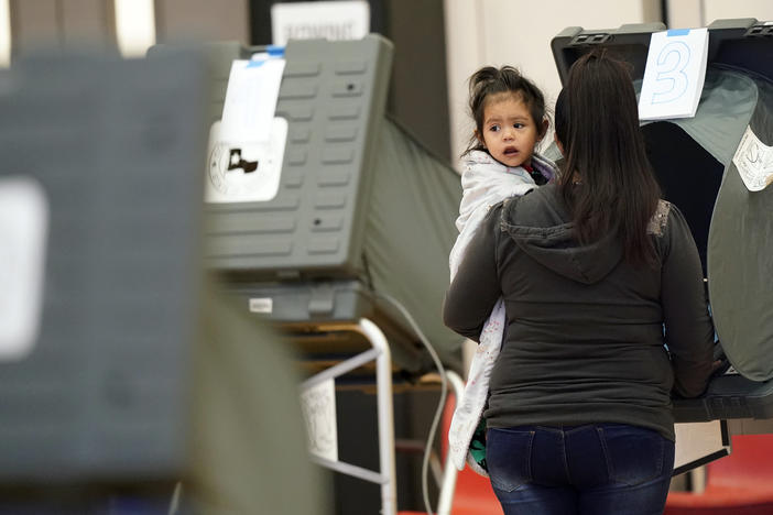 A voter and her daughter cast a ballot in Houston during the 2020 general election. New bills passed by Texas lawmakers target how elections are run in Harris County, which is home to Houston.