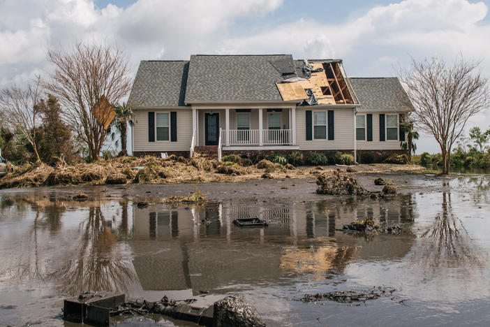 Floodwater surrounds a house on Sept. 1, 2021, in Jean Lafitte, La. Hurricane Ida made landfall as a powerful Category 4 causing flooding and wind damage along the Gulf Coast.