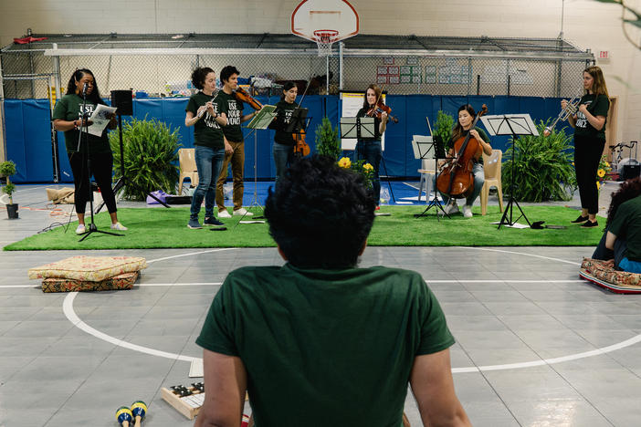 Residents listen as <a href="https://www.soundimpact.org/">Sound Impact</a> musicians play during the final performance of their three-day residency at the Northern Virginia Juvenile Detention Center in Alexandria, Va.