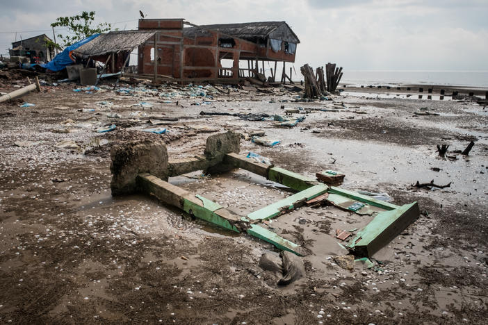 High tides have destroyed roads and structures in Vietnam as rising sea levels threaten farmland in the country's Mekong River Delta.