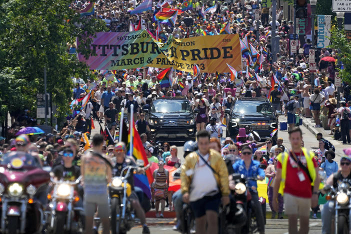 The Pittsburgh Pride parade, celebrating 50 years of Pittsburgh Pride, crosses the Andy Warhol Bridge from downtown Pittsburgh on June 3. Longtime Pride sponsors have come under attack by conservatives for their LGBTQ-friendly marketing.