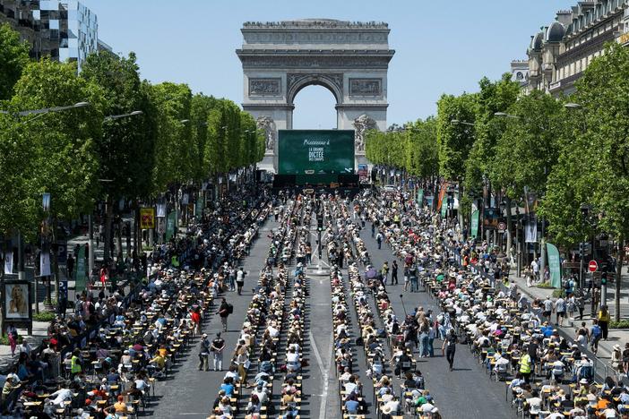 A massive dictation event takes place on the Champs-Élysées in Paris on Sunday.