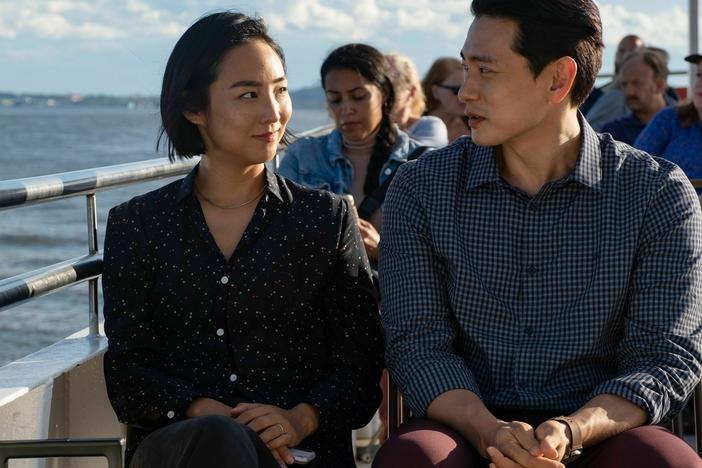 Greta Lee (left) and Teo Yoo (right) play Nora and Hae Sung, two childhood sweethearts who reconnect as adults.