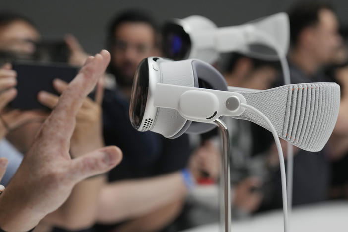 The Apple Vision Pro headset is displayed in a showroom on the Apple campus in Cupertino, Calif., at the company's annual developers conference, Monday, June 5, 2023.