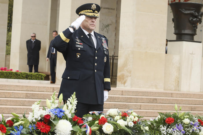 U.S Joint Chiefs of Staff Chairman Gen. Mark Milley salutes during a D-Day anniversary ceremony at the American Cemetery in Colleville-sur-Mer, Normandy, France on Tuesday.