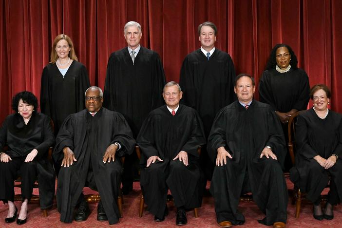 Of the nine justices of the U.S. Supreme Court, only Justice Clarence Thomas (seated second from left) and Justice Samuel Alito (seated fourth from left) did not file their financial disclosures. They asked for — and were granted — extensions.