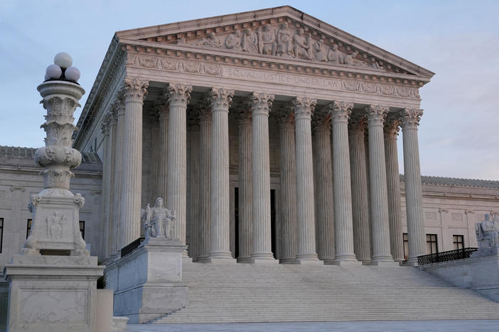 The setting sun illuminates the Supreme Court building on Capitol Hill in Washington, D.C., on Jan. 10.