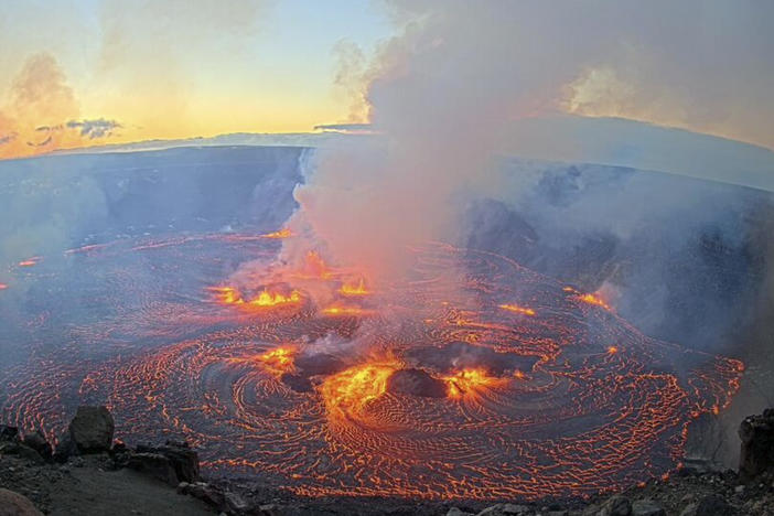 In this webcam image provided by the U.S. Geological Survey, an eruption takes place on the summit of the Kilauea volcano in Hawaii, Wednesday morning, June 7, 2023.