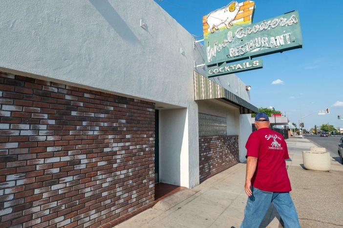 Customers arrive for the dinner service at Wool Growers, a 67-year-old Basque restaurant in House Speaker Kevin McCarthy's district. The Republican leader is facing opposition from within his own party, but back home, some constituents are praising his performance under tough circumstances.