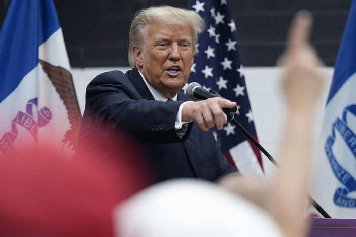 Former President Donald Trump visits with campaign volunteers at the Grimes Community Complex Park on June 1 in Des Moines, Iowa.