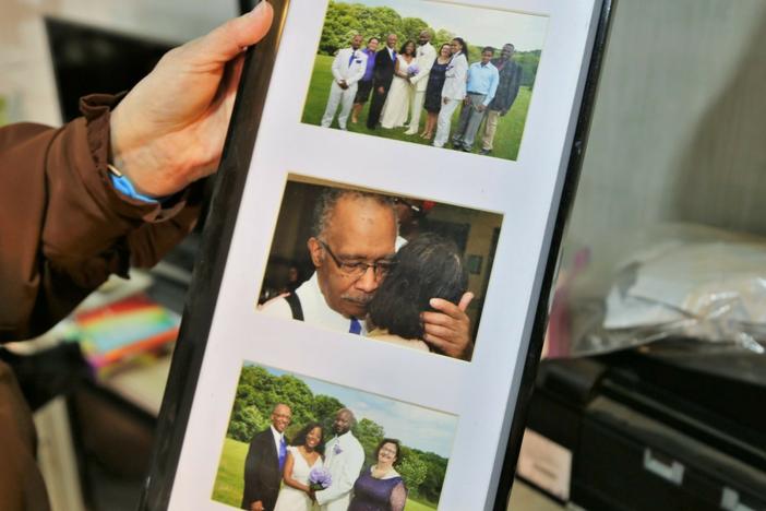 Sharon Gwinn holds a picture of her husband, who had Lewy body dementia toward the end of his life. Reckless financial behavior was one of the first signs of the disease. "It's what attacked his brain first," Gwinn says.