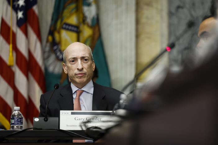 Securities and Exchange Commission Chair Gary Gensler listens during a meeting of top financial regulators at the U.S. Treasury Department on Oct. 3, 2022, in Washington, D.C. The SEC's lawsuit against crypto exchanges Binance and Coinbase this week are intended to bring both under the regulatory purview of the agency.