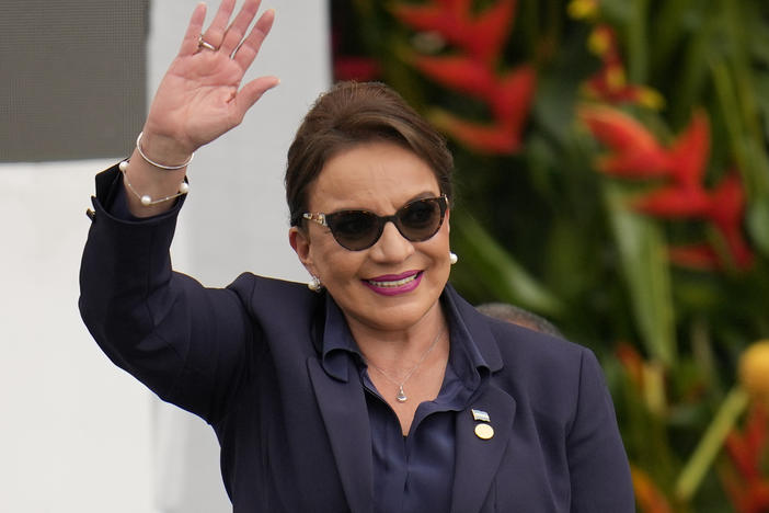 FILE - Honduras' President Xiomara Castro waves during the swearing-in ceremony for Colombia's President Gustavo Petro in Bogota, Colombia, Sunday, Aug. 7, 2022. Castro has flown to China on Tuesday, June 6, 2023, to meet with President Xi Jinping.