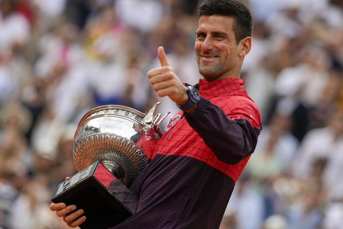 Serbia's Novak Djokovic celebrates winning the men's singles final match of the French Open tennis tournament against Norway's Casper Ruud in three sets at the Roland Garros stadium in Paris, Sunday.