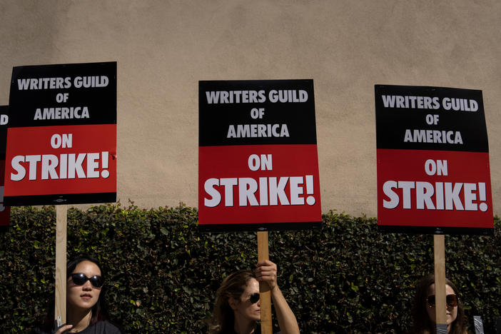 Screenwriters around the world are organizing pickets and other actions on June 14 in support of the ongoing Writers Guide of America strike. Above, Writers Guild of America workers picket outside the Warner Brother studios, on May 2, 2023 in Burbank, Calif.