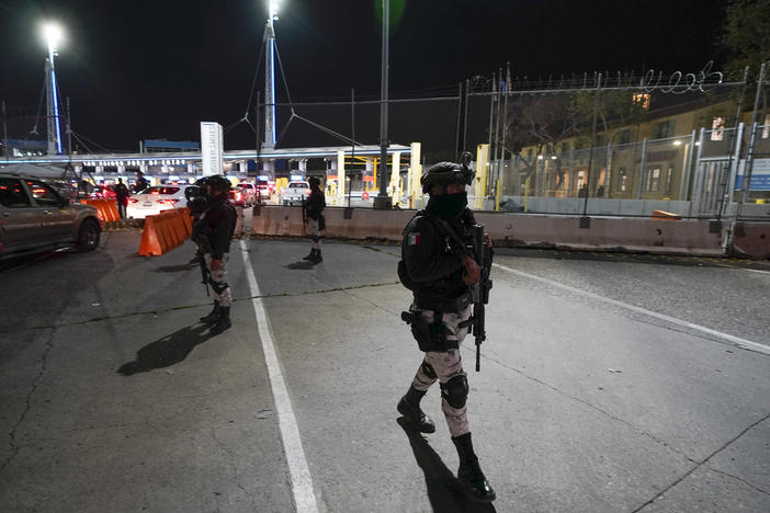 Mexican National Guards patrol among the lanes of cars entering the San Ysidro Port of Entry in Tijuana, Mexico, May 11, 2023. Montserrat Caballero, the mayor of the Mexican border city of Tijuana, said on June 12, 2023 she has decided to go live at an army base for her own safety, after she received threats.