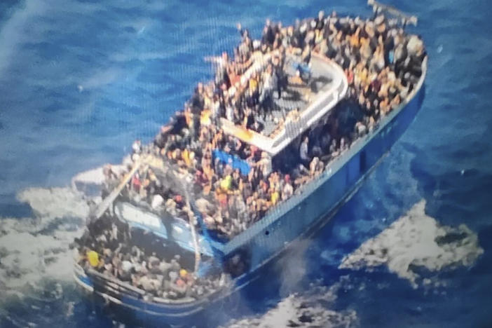 This undated handout image provided by Greece's coast guard on Wednesday, June14, 2023, shows scores of people covering practically every free stretch of deck on a battered fishing boat that later capsized and sank off southern Greece.