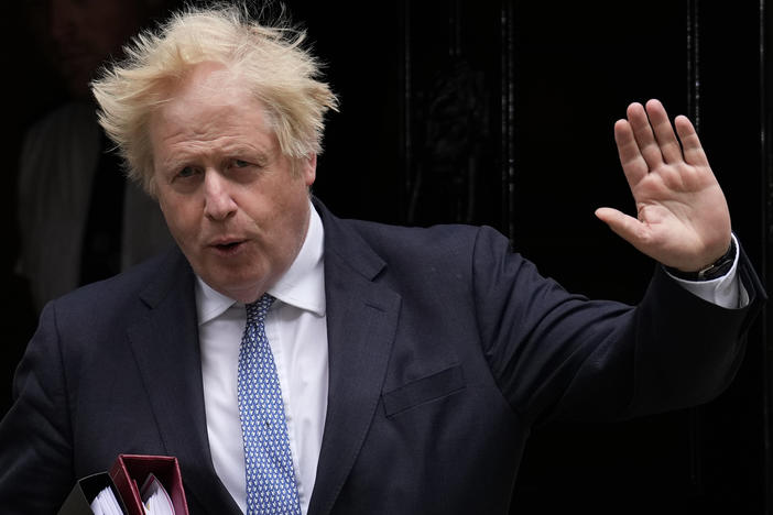 British Prime Minister Boris Johnson is shown leaving 10 Downing Street to attend the weekly Prime Minister's Questions at the Houses of Parliament, in London, on May 25, 2022.